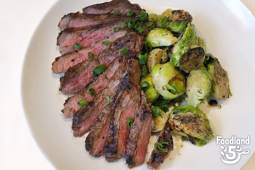 Bone-In NY Strip Steak with Sauteed Brussels Sprouts